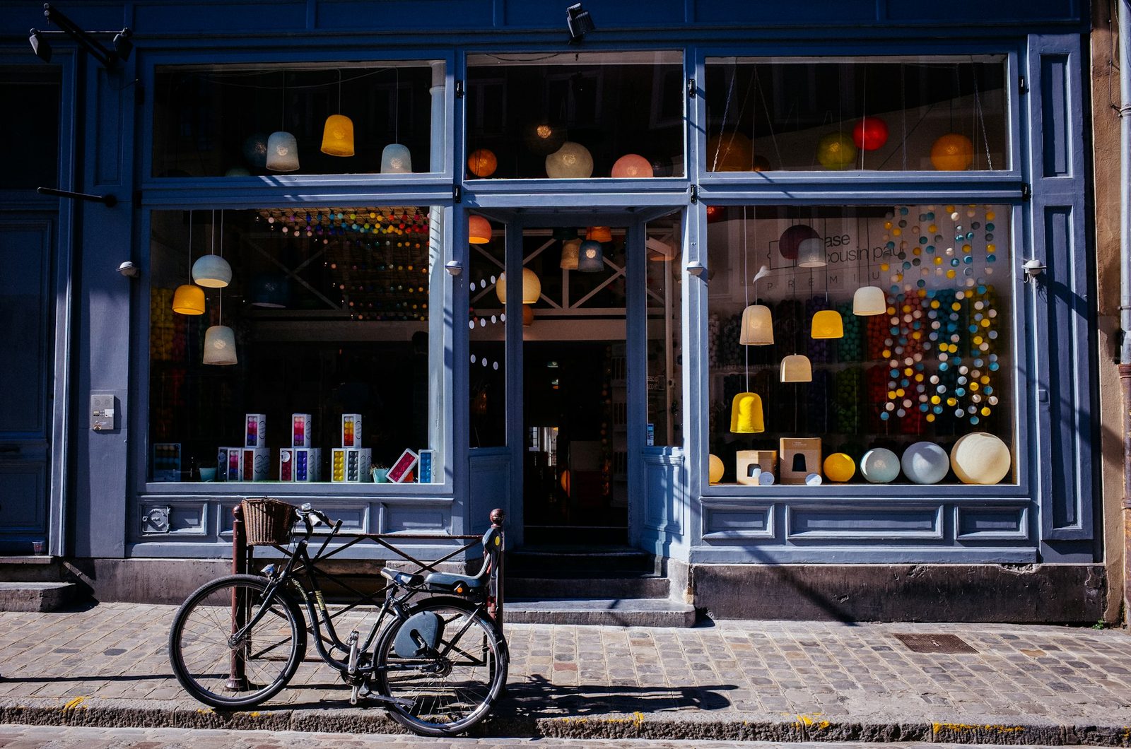 A small independent shopfront with bicycles parked outside.